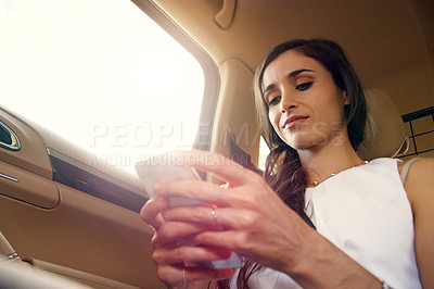 Buy stock photo Business woman, car and cellphone for social media, video streaming or texting in urban for commute. Journalist or editor in transport with tech for online information, website or internet app 
