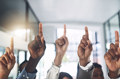 Buy stock photo Closeup shot of a group of businesspeople raising their hands in an office