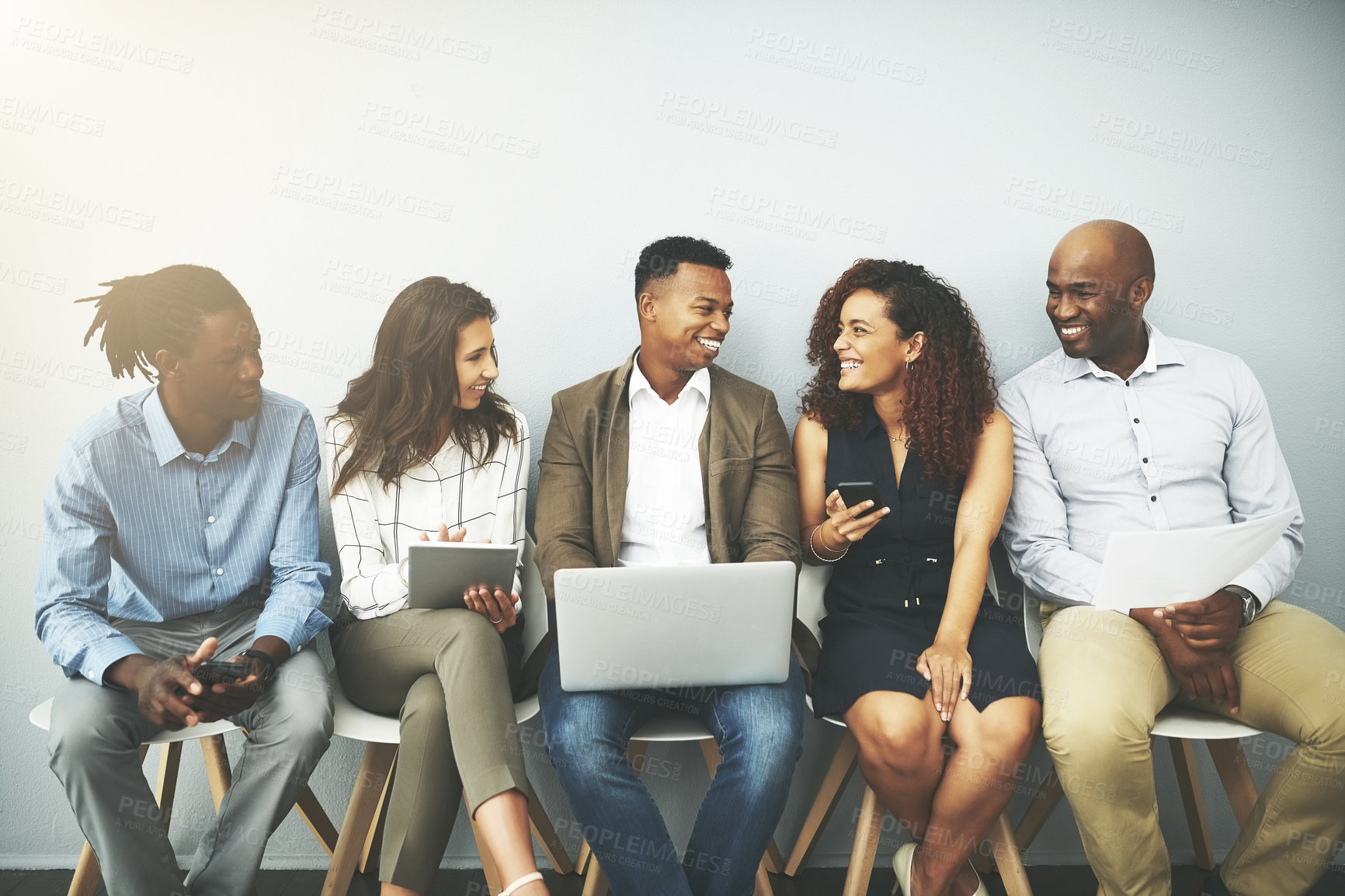 Buy stock photo Laptop, talking and row of business people on tablet for online review, survey and networking. Diversity, company and queue of men and women on technology for research, website and feedback in office