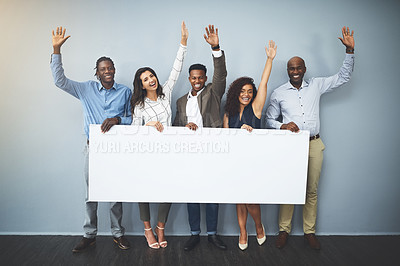 Buy stock photo Business people, portrait and hands raised with billboard or team for banner, presentation or advertising on a wall background. Group of employees with poster, sign or inclusion or mockup space