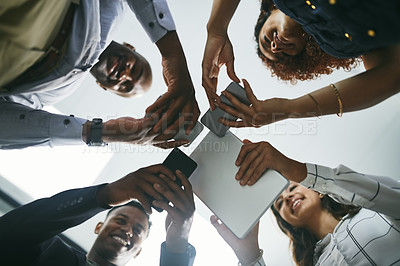 Buy stock photo Technology, connection and hands of happy people in circle for data sharing, meeting or collaboration in business. Phone, tablet and team at digital agency in networking, research or group from below