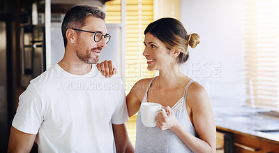 Buy stock photo Couple, kitchen and coffee in the morning with smile, bonding and spending time together. Love, trust and commitment with marriage partner, communication and happiness with hot drink at home