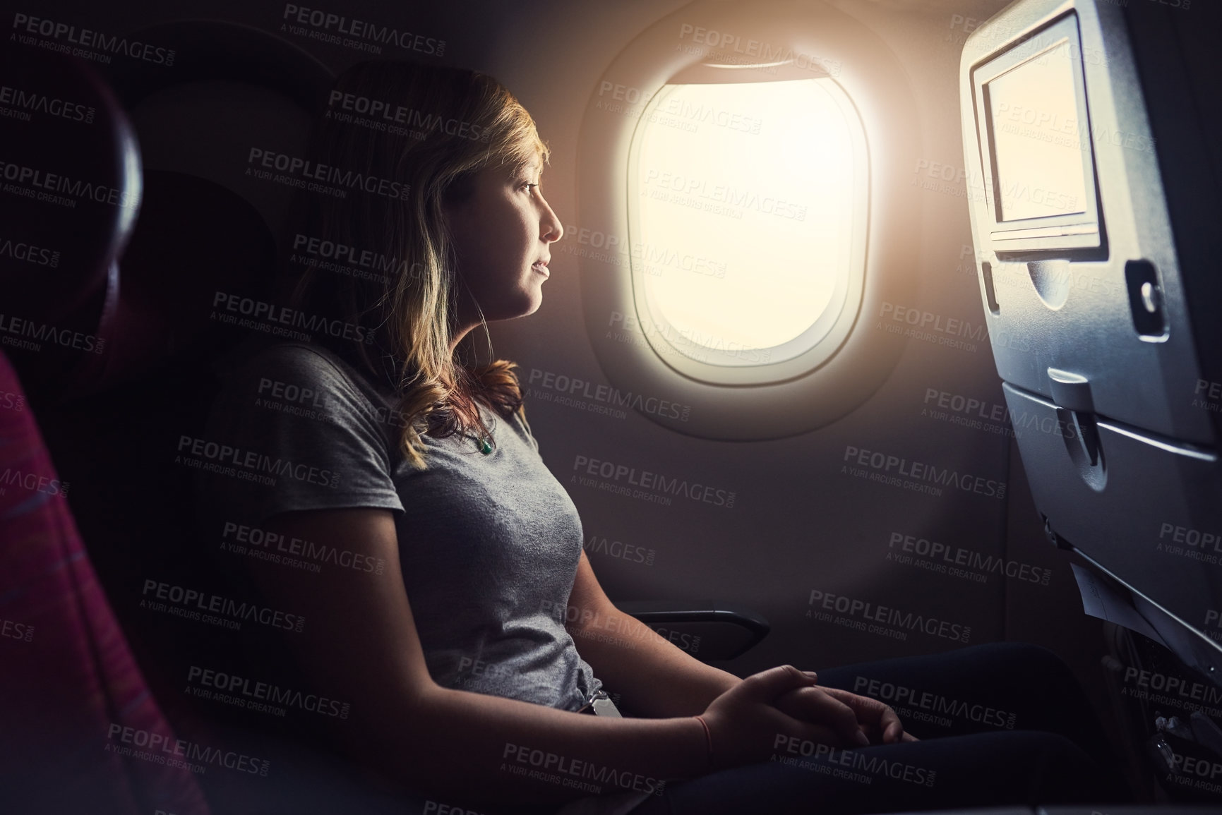 Buy stock photo Airplane, air and woman by window for travel, international journey and global commute. Commercial transport, flight passenger and person on aeroplane with view for holiday, adventure and vacation