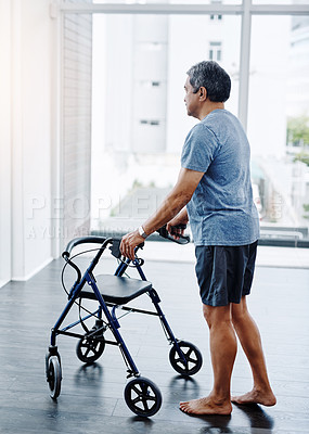 Buy stock photo Physiotherapy, senior man and walker for support, elderly care or wellness for health or fitness. Pensioner, male person and rollator for balance, walking and mobility in rehab clinic or consultation