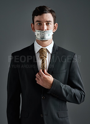 Buy stock photo Businessman, portrait and money gag with noose tie, finance debt and corporate economy pressure. Model, hanging and cost crisis for financial bondage, failure and execution on gray studio background