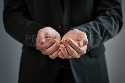 Buy stock photo Begging, hands and poverty with business man in studio on gray background for bankruptcy or unemployment. Asking, charity and offer with open palms of person for debt, donation or help closeup