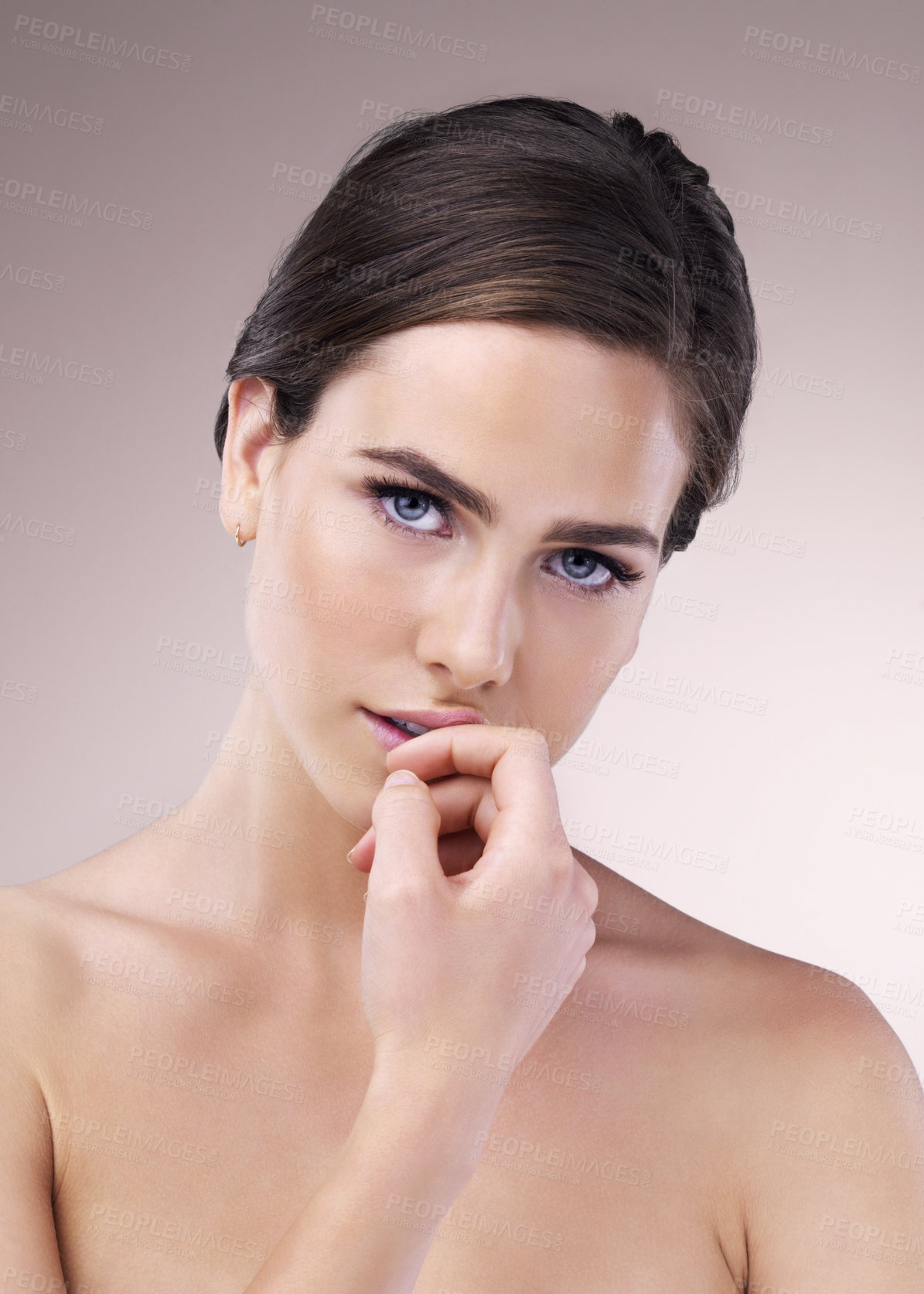 Buy stock photo Portrait, woman and skincare with cosmetics, beauty and wellness for dermatology in studio backdrop. Female person, healthy skin and cosmetology in blue background for hydration, collagen and glow