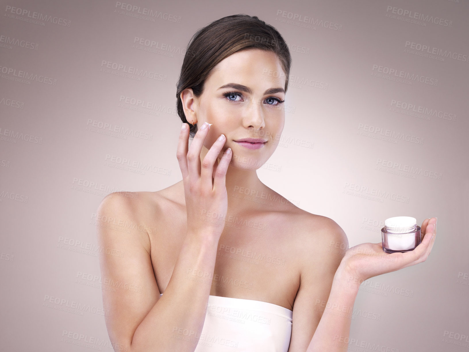 Buy stock photo Skincare, portrait or girl with face cream application for wellness, repair or cosmetic shine on studio background. Beauty, facial and model with skin product, treatment or dermatology sunscreen