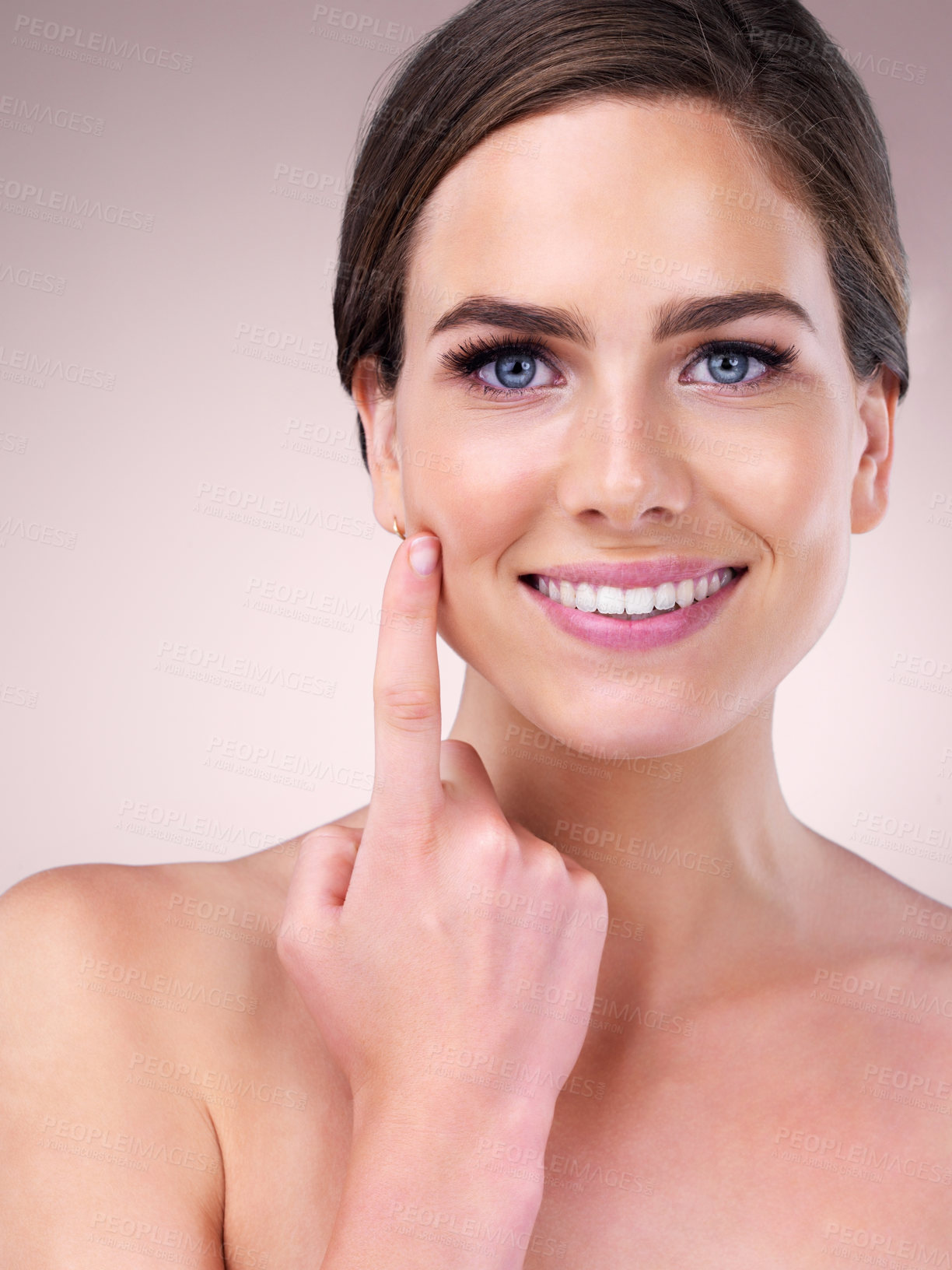 Buy stock photo Happy, skincare and portrait of women pointing in studio for wellness, facial treatment and cosmetics. Dermatology, salon aesthetic and person on pink background for natural, healthy skin and beauty