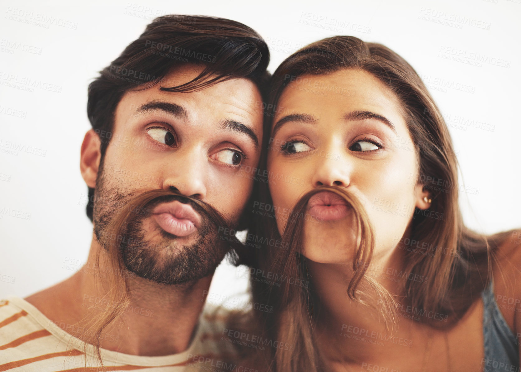 Buy stock photo Couple, house and hair mustache with pout, fun and kissing face with meme, bonding and love together. Young man, woman and silly romance for relaxing smile with care, happiness and comic joke