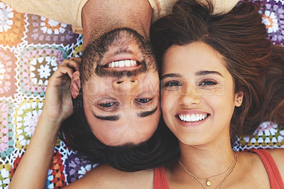 Buy stock photo Couple, portrait and above with smile on blanket, relax and upside down on picnic, holiday and bonding. Indian people, man and woman with headshot for connection, love and care on vacation in Mumbai