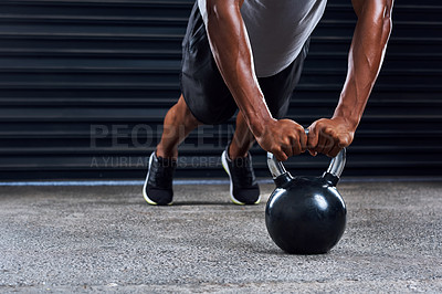 Buy stock photo Cropped shot of an unrecognizable man working out with weight