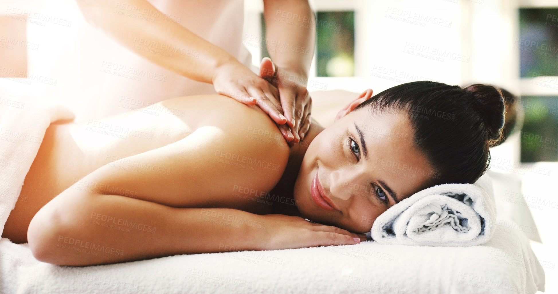 Buy stock photo Happy woman, relax and massage at spa for healthy wellness, skincare or stress relief at resort. Calm female person relaxing with smile in peaceful zen or luxury body and back treatment at the salon