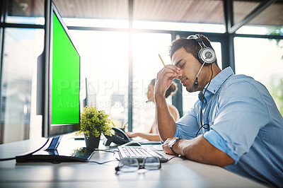 Buy stock photo Businessman, call center and headache with green screen in burnout, stress or overworked at office. Man person, consultant or agent with bad head pain or anxiety with mockup chromakey at workplace