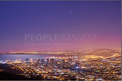 Buy stock photo Copy space with twilight night sky over the view of a coastal city seen from Signal Hill in Cape Town South Africa. Scenic panoramic landscape of lights illuminating an urban skyline along the sea