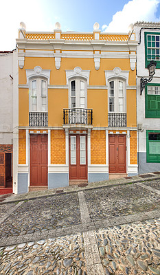 Buy stock photo Colorful buildings in the streets of Santa Cruz de La Palma. Houses or homes built in a vintage architecture design in a small town or village. Bright and vibrant city for vacations or holidays