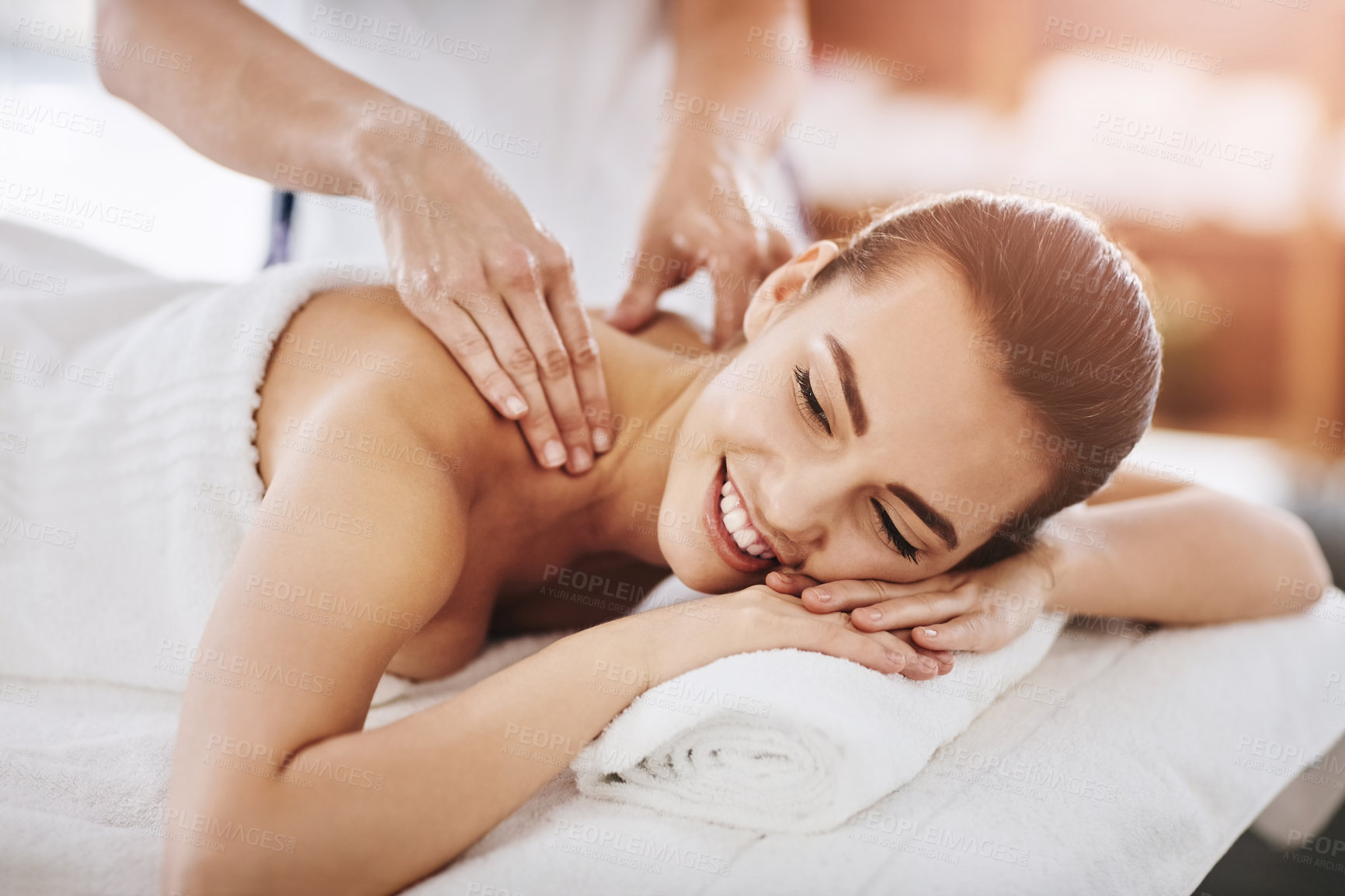 Buy stock photo Relax, smile and massage with woman in spa for wellness, luxury and cosmetics treatment. Skincare, peace and zen with female customer and hands of therapist for physical therapy, salon and detox