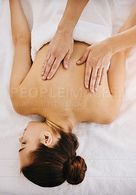 Buy stock photo Back, beauty and massage with woman in spa for wellness, luxury and cosmetics treatment from above. Skincare, peace and zen with female customer and hands of therapist for therapy, salon and detox