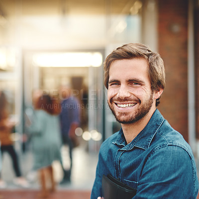 Buy stock photo Male student, portrait and smile at university for education, folder for learning and development.. Man, college campus and excited for scholarship opportunity, happiness and knowledge with pride