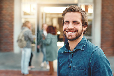 Buy stock photo Portrait of a happy young man standing outdoors on campus