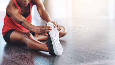 Buy stock photo Fitness, African woman stretching for healthy exercise and in studio or gym. Athlete hands training or workout on mockup space, shoe closeup and female person stretch legs for body goals or wellness