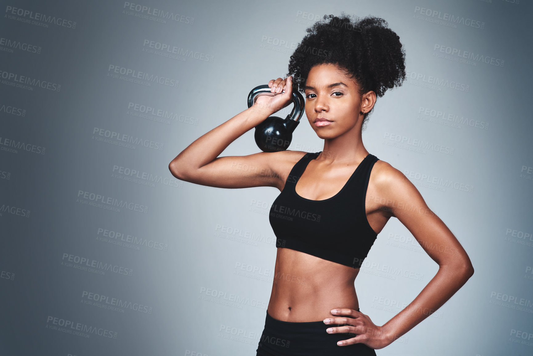 Buy stock photo Portrait, black woman and workout with kettle bell in studio on grey background to exercise for health or fitness. Female person, confident and weights for gym or training, wellbeing and wellness