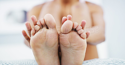 Buy stock photo Skincare, moisturizer and feet of woman on bed for smooth, pedicure or healthy skin at home. Dermatology, podiatry and closeup of foot of female person for body care, wellness and health in bedroom