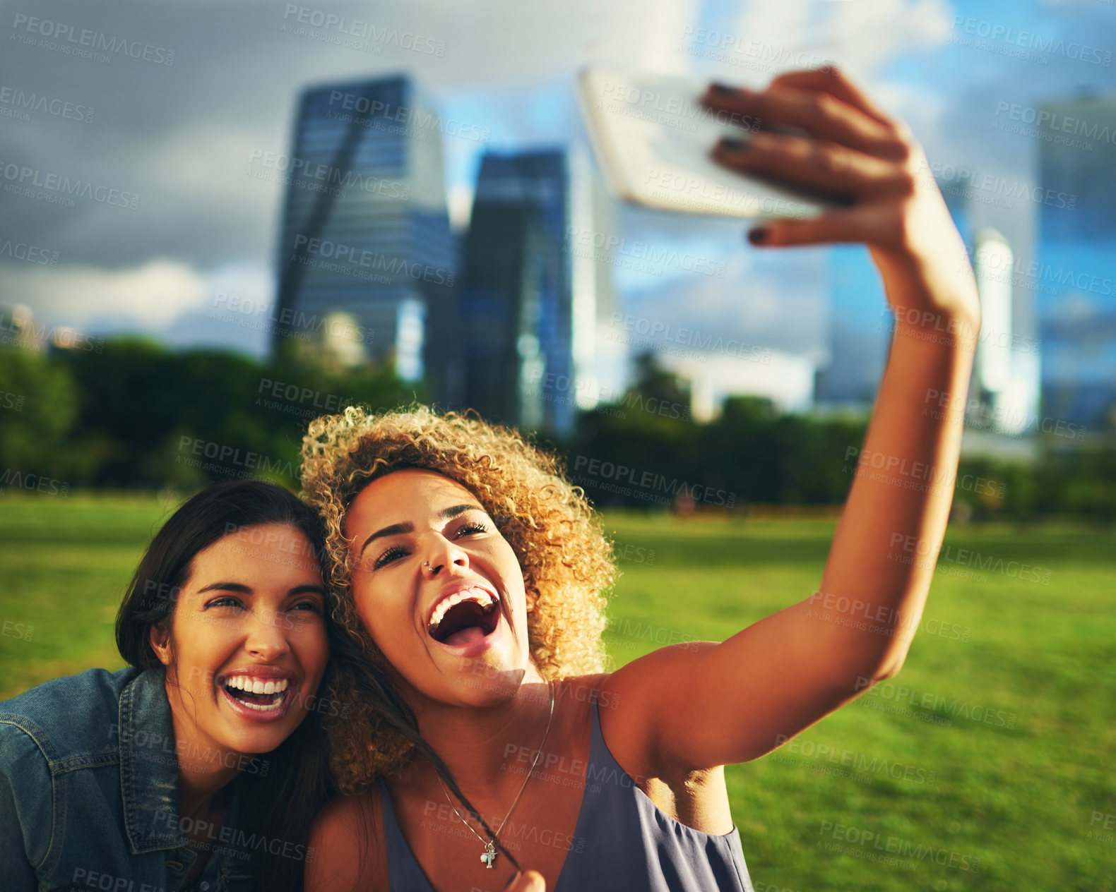 Buy stock photo Friends, happy and women in park for selfie, relax and social media with grass, sunshine and smile. People, excited and memory outdoor for hangout, holiday and bonding with leisure, fun and streaming