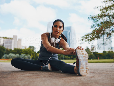 Buy stock photo Woman, fitness and stretching legs outdoor in city for healthy body, flexible and exercise for wellness. Sports, start and runner warm up muscle to prepare for workout, training or marathon on road