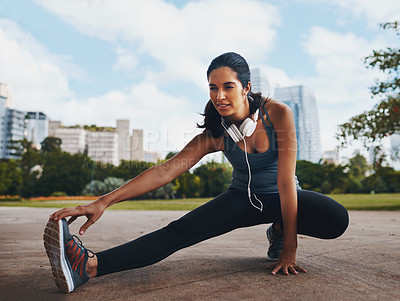 Buy stock photo Woman, fitness and stretching legs at park in city for healthy body, flexible and exercise for wellness. Sports, start and runner warm up muscle to prepare for workout, training or marathon on road