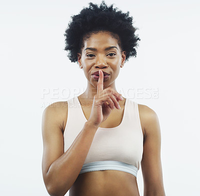 Buy stock photo Black woman, portrait and fitness with secret for workout, routine or privacy on a white studio background. Face of African or female person with silence or whisper for training or exercise on mockup