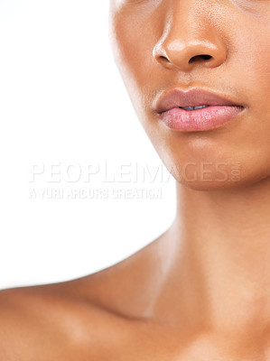 Buy stock photo Studio closeup of an unrecognizable woman standing against a white background during the day