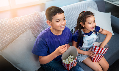 Buy stock photo Children, popcorn and television or excited on couch in home for movie entertainment, siblings or subscription. Boy, girl and sofa in apartment with snacks together in living room, streaming or film