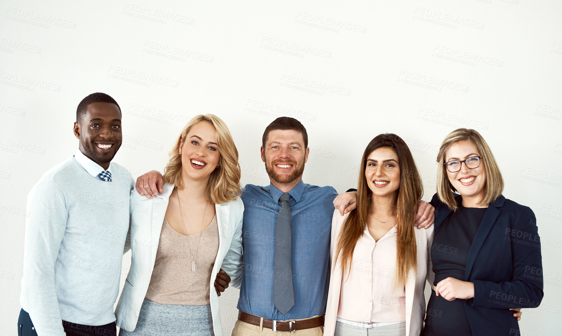 Buy stock photo Business people, portrait hug and smile of lawyers by white wall background mockup in workplace. Face, confident group and standing together with collaboration, diversity and teamwork for cooperation