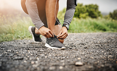 Buy stock photo Person, hands and shoelace with fitness or exercise for running, health and wellbeing in outdoor. Road, sneakers and committed on workout or jog in morning for training, wellness and self care