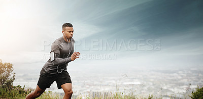 Buy stock photo Man, running and space for fitness with cityscape for exercise, wellness or music with mockup for health. African male runner listening to audio for focus, workout and nature outdoor with mock up sky