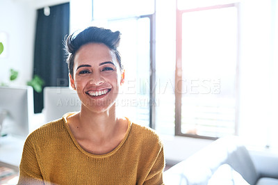 Buy stock photo Cropped portrait of a confident and attractive young businesswoman standing in an office
