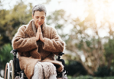 Buy stock photo Senior woman in wheelchair, praying outdoor with worship and God with peace, disability with gratitude and faith. Spiritual female person in nature, mockup space and paralysis, disabled and prayer