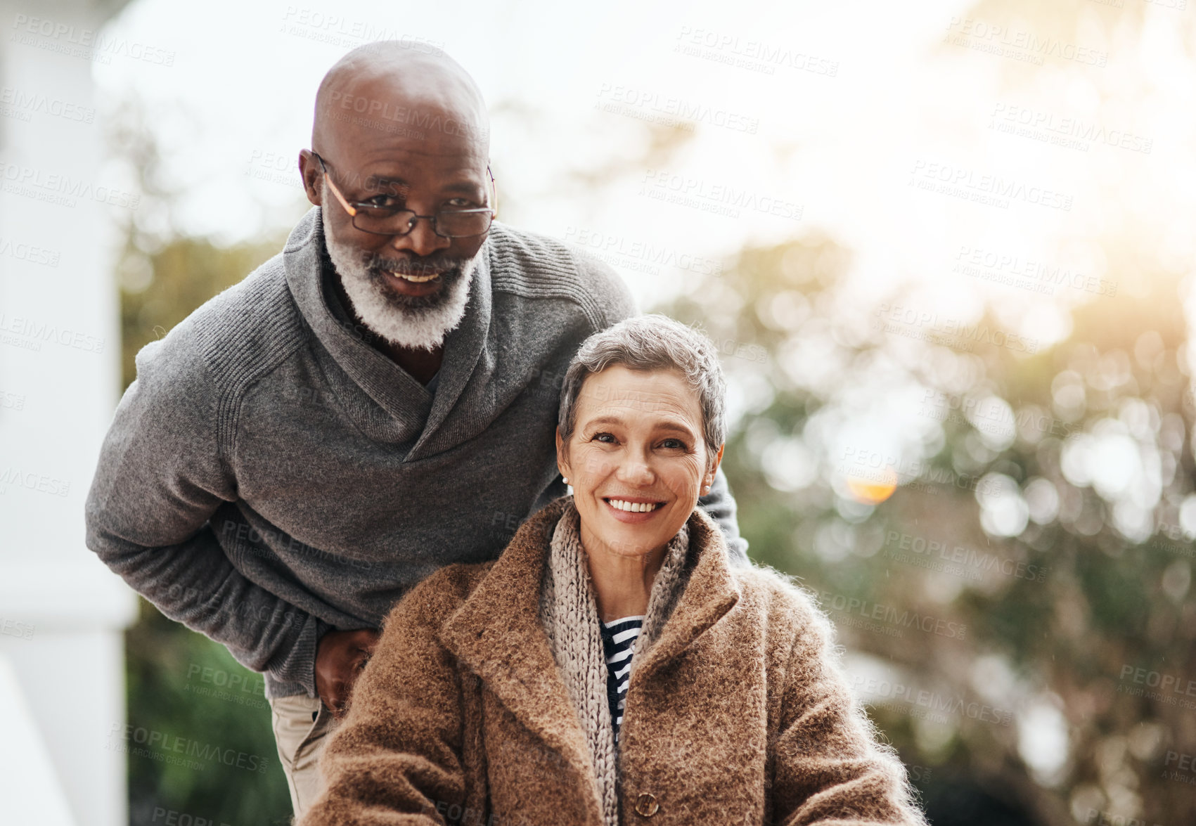 Buy stock photo Old couple, wheelchair and outdoor portrait to help woman, love and support with arthritis or rehabilitation. People, marriage commitment and person with disability in retirement, injury and recovery