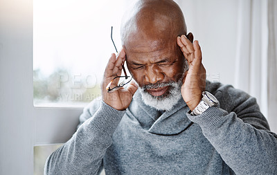 Buy stock photo Headache, pain and senior man with migraine, mental health risk, retirement stress or mind problem at home. Memory, tired and sick or african person massage temple by window, brain fog and healthcare
