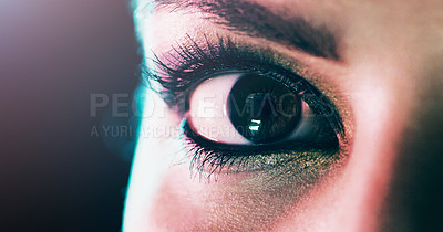 Buy stock photo Closeup portrait of a beautiful young woman's eye against a dark background