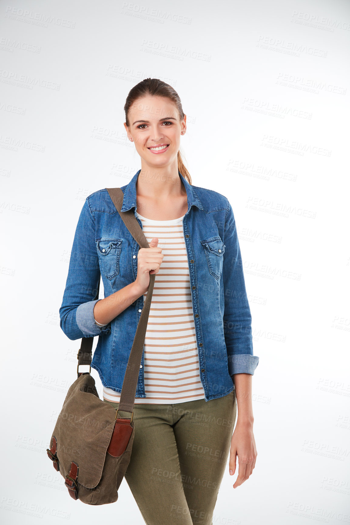 Buy stock photo Studio portrait of an attractive young woman posing against a grey background