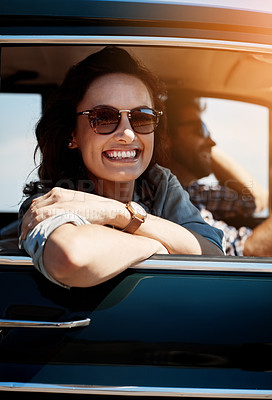 Buy stock photo Portrait of a young woman out on a road trip with her partner