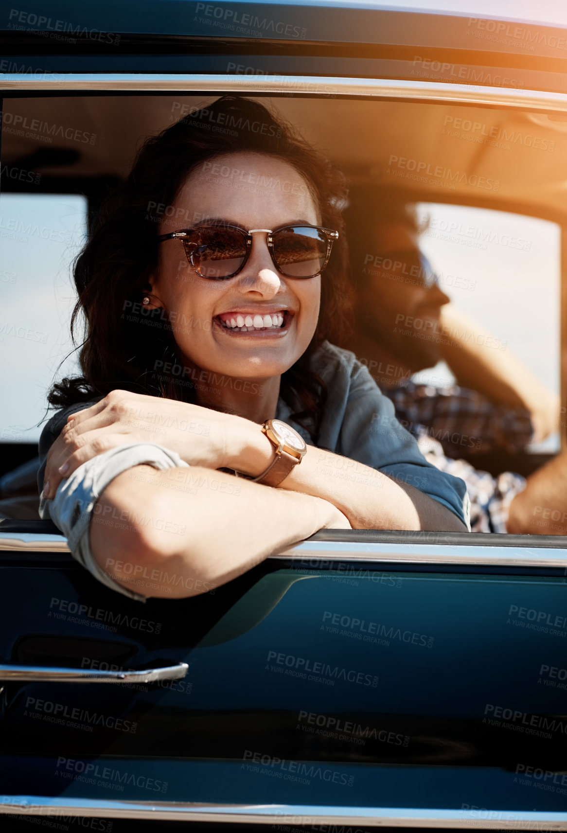 Buy stock photo Portrait of a young woman out on a road trip with her partner