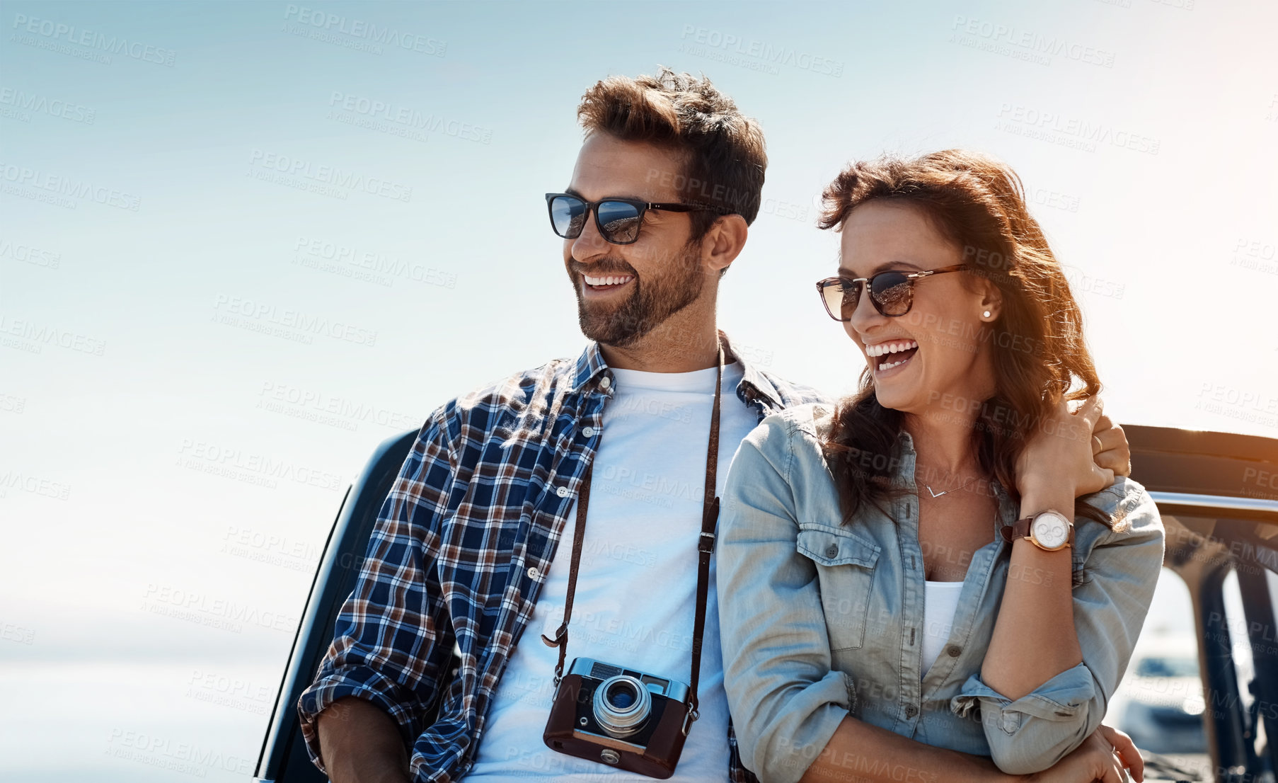 Buy stock photo Cropped shot of an affectionate couple taking in the sights while enjoying a road trip