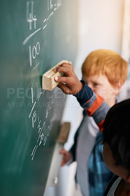 Buy stock photo Chalkboard, education and kids in maths class at school for child development, learning or study. Equation, solution and writing with students in classroom for academic knowledge or scholarship