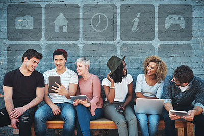 Buy stock photo Technology, diversity and group of young people on a bench browsing social media or the internet. Digital tablets, laptop and multiracial friends networking online together with icons by a gray wall.