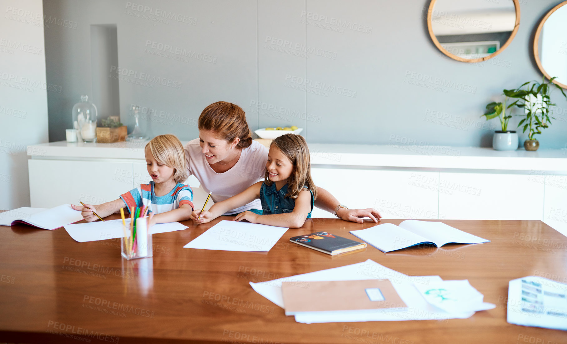 Buy stock photo Mother, children and paper in home for education, distance learning and creativity for growth. House wife, kids and happy at table for knowledge, fun activity and writing skill development in lesson