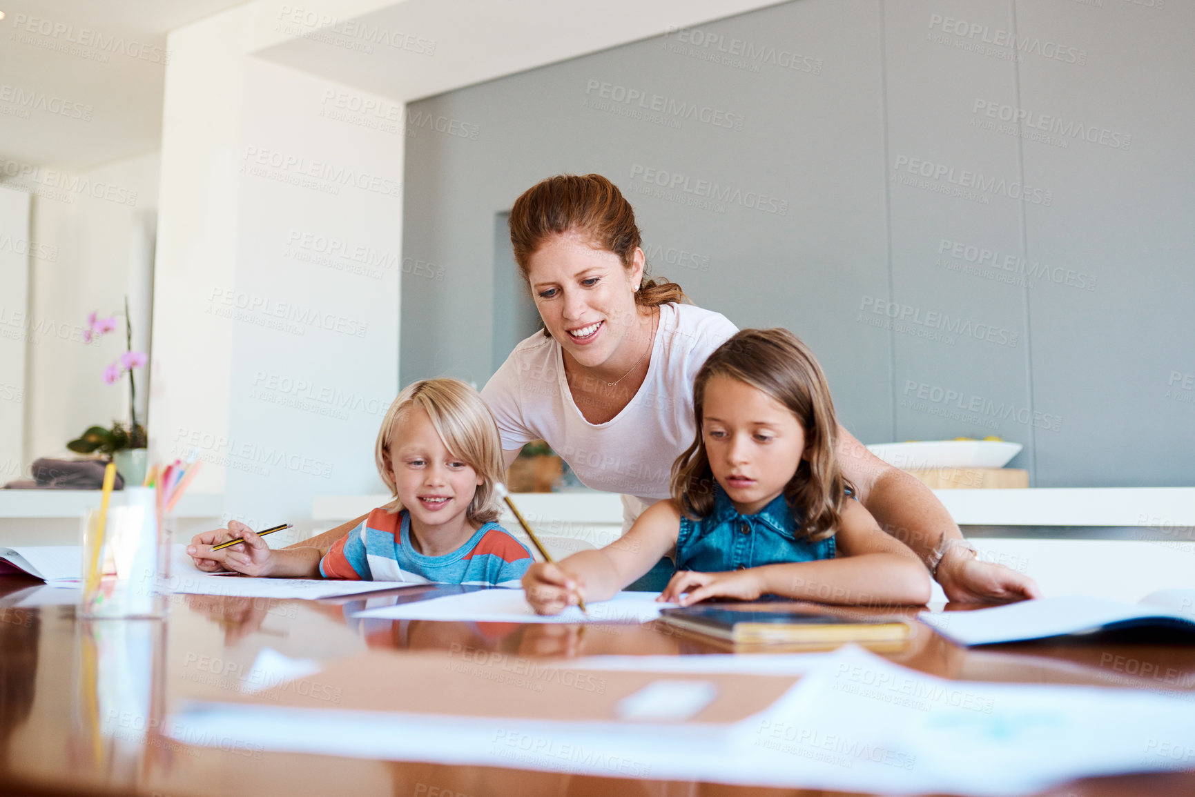 Buy stock photo Mother, children and writing in home for education, distance learning and creativity for growth. House wife, kids and happy at table for knowledge, fun activity and vocabulary development in lesson