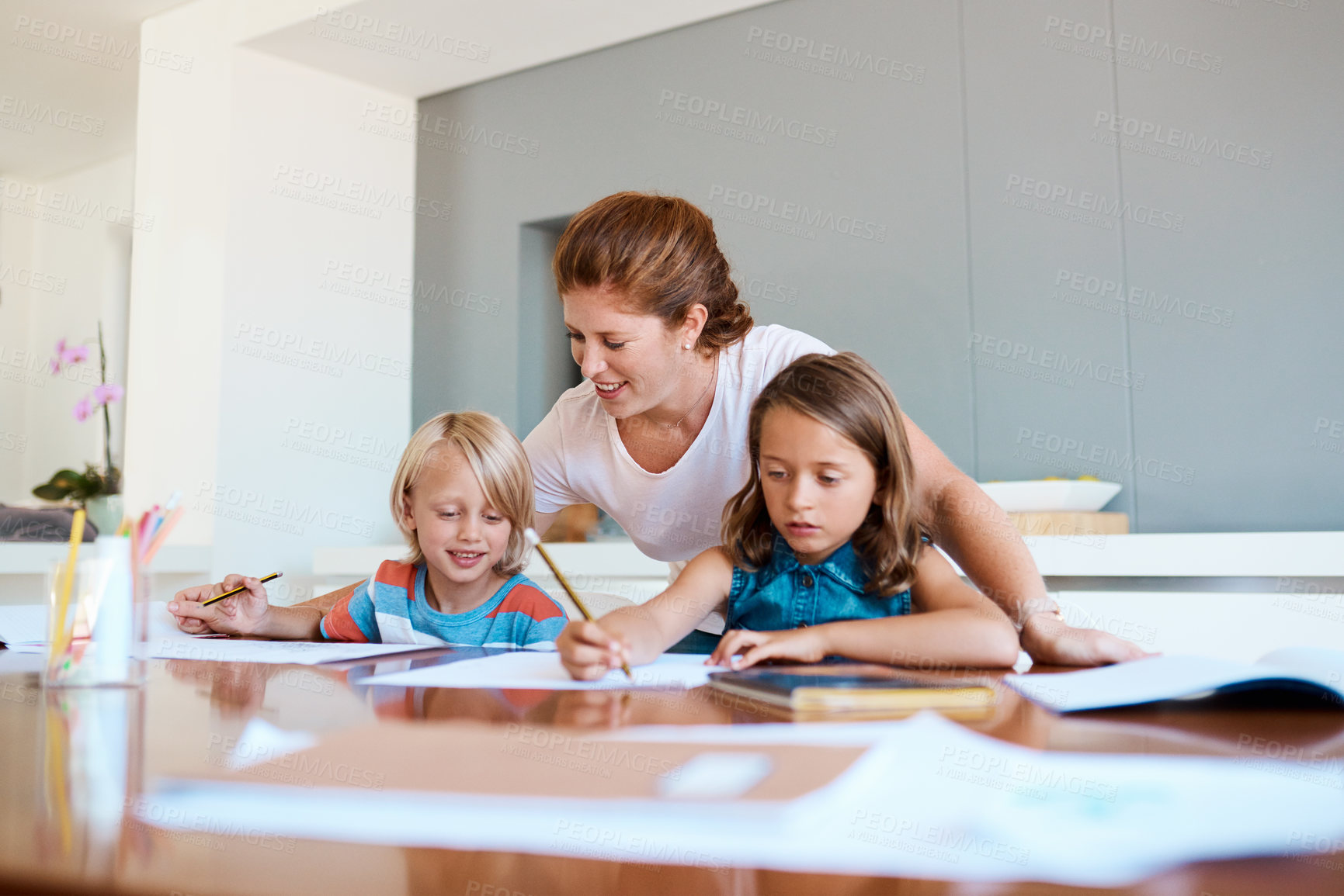 Buy stock photo Mother, kids and writing in home for education, distance learning and creativity for growth. House wife, children and happy at table for knowledge, fun activity and vocabulary development in lesson